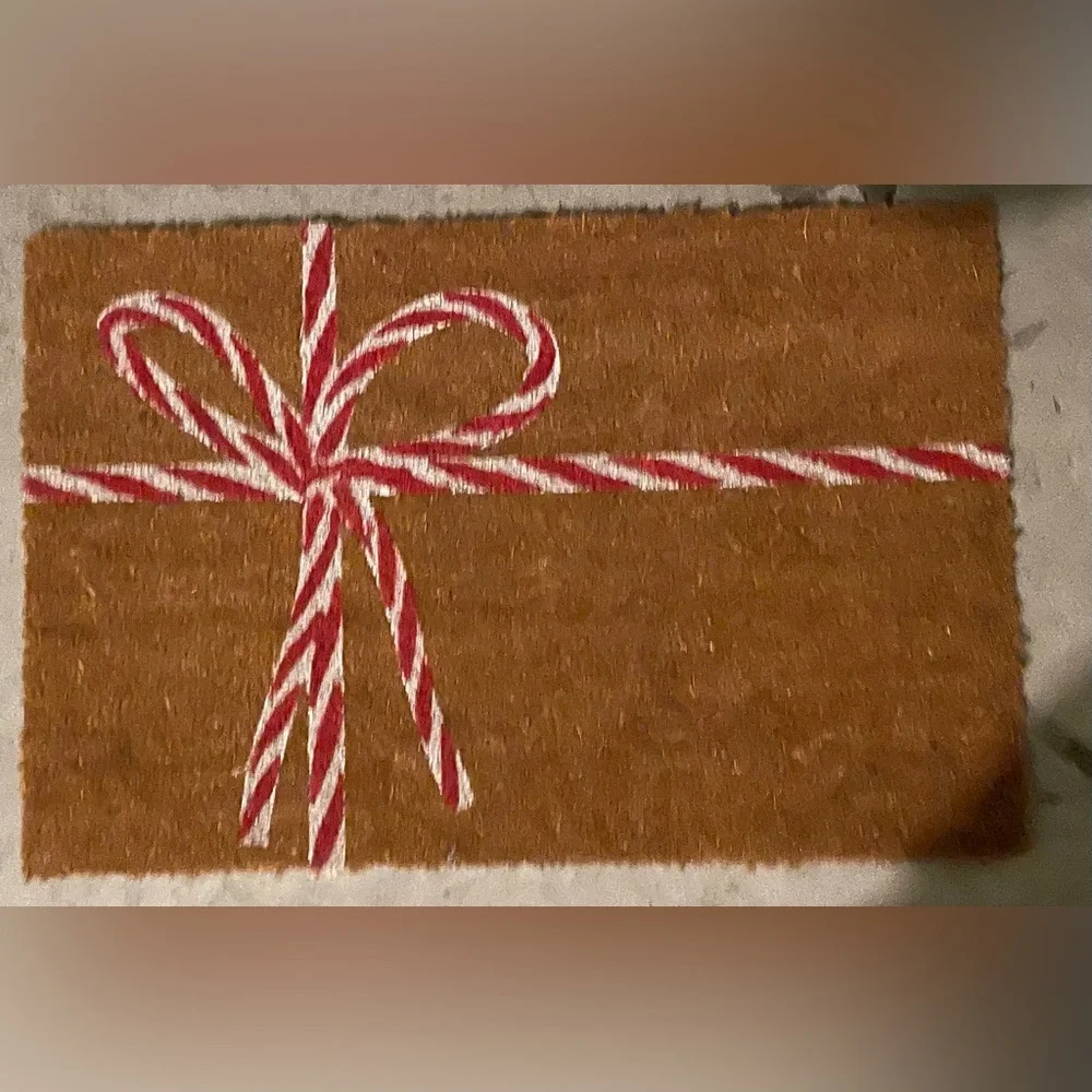 Brown Doormat with Red and White Bow Design